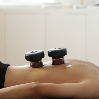 Massageur électrique à vide à lumière rouge